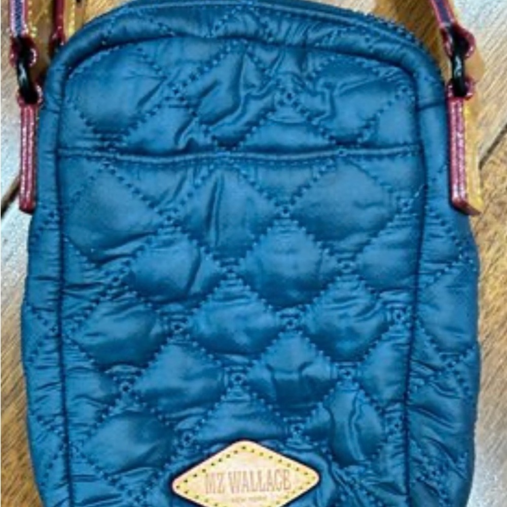 Mz Wallace Blue Quilted Crossbody Bag
26” adjustable strap